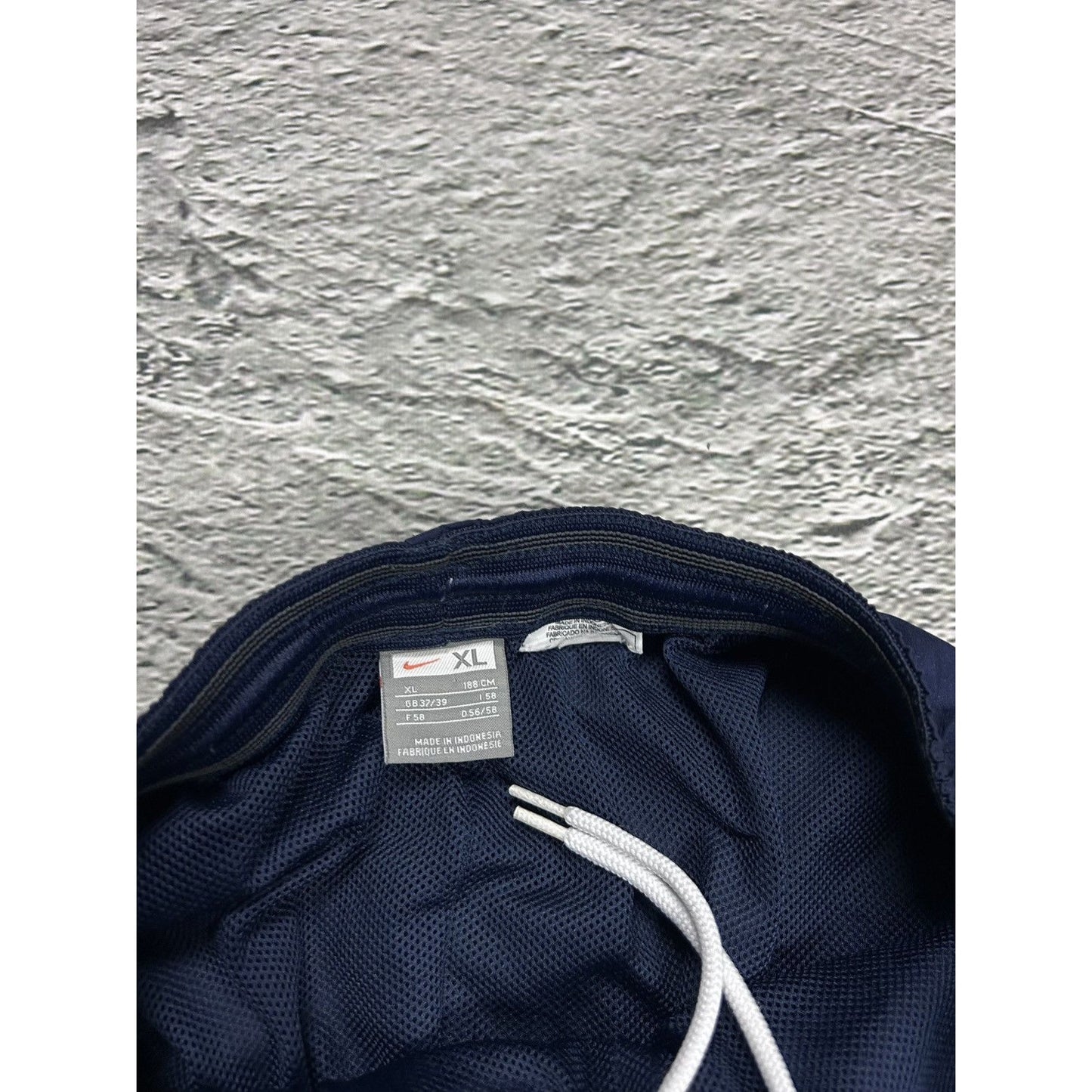 Nike vintage navy track pants nylon small logo parachute Y2K