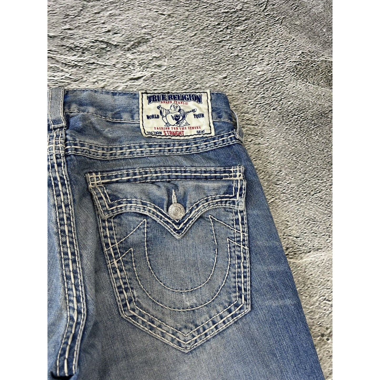 True Religion baby blue jeans white thick stitching straight