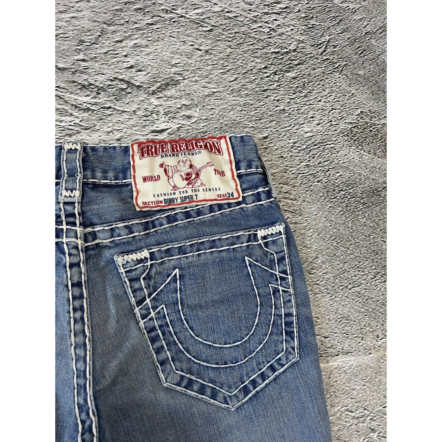 True Religion baby blue jeans white thick stitching Bobby