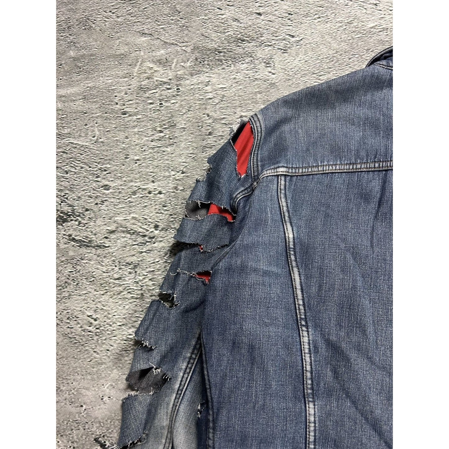 Dolce & Gabbana denim jacket distressed blue red avant garde