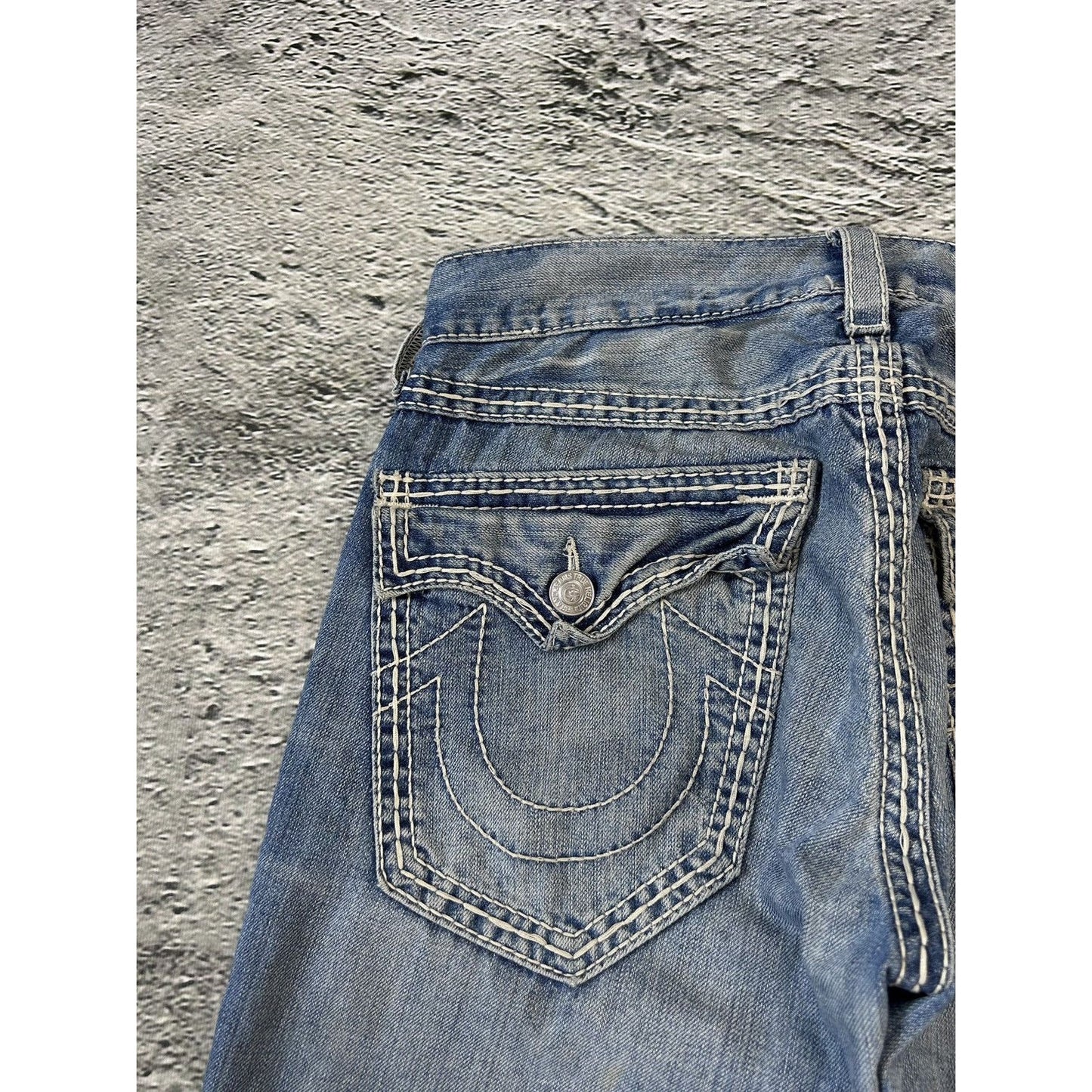 True Religion baby blue jeans white thick stitching straight