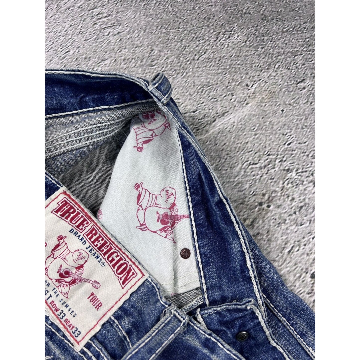 True Religion blue jeans white thick stitching Bobby