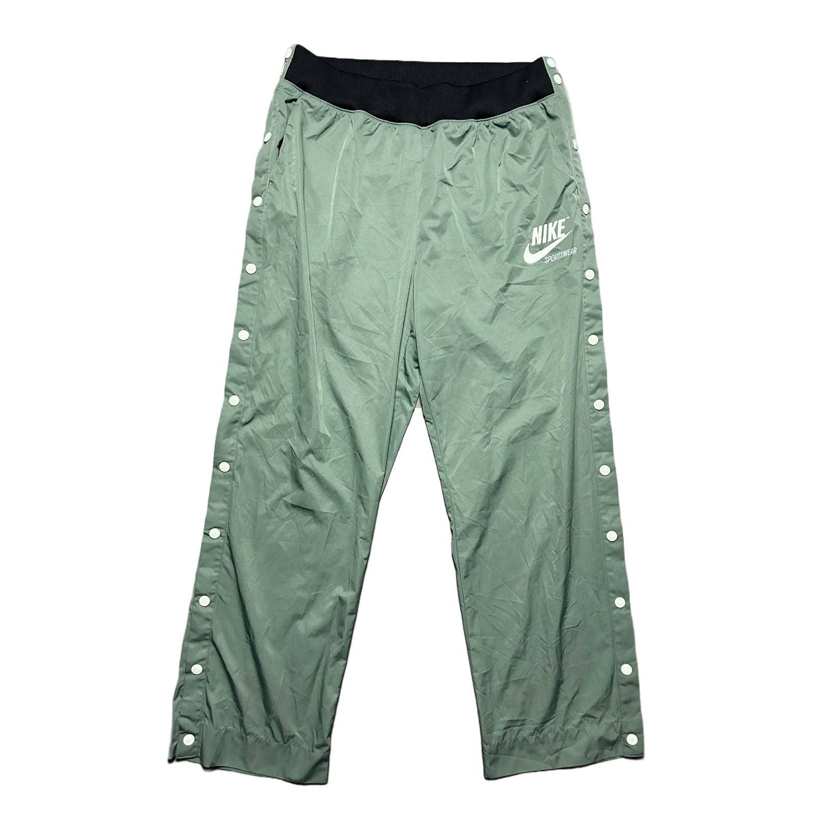 Nike button track pants online