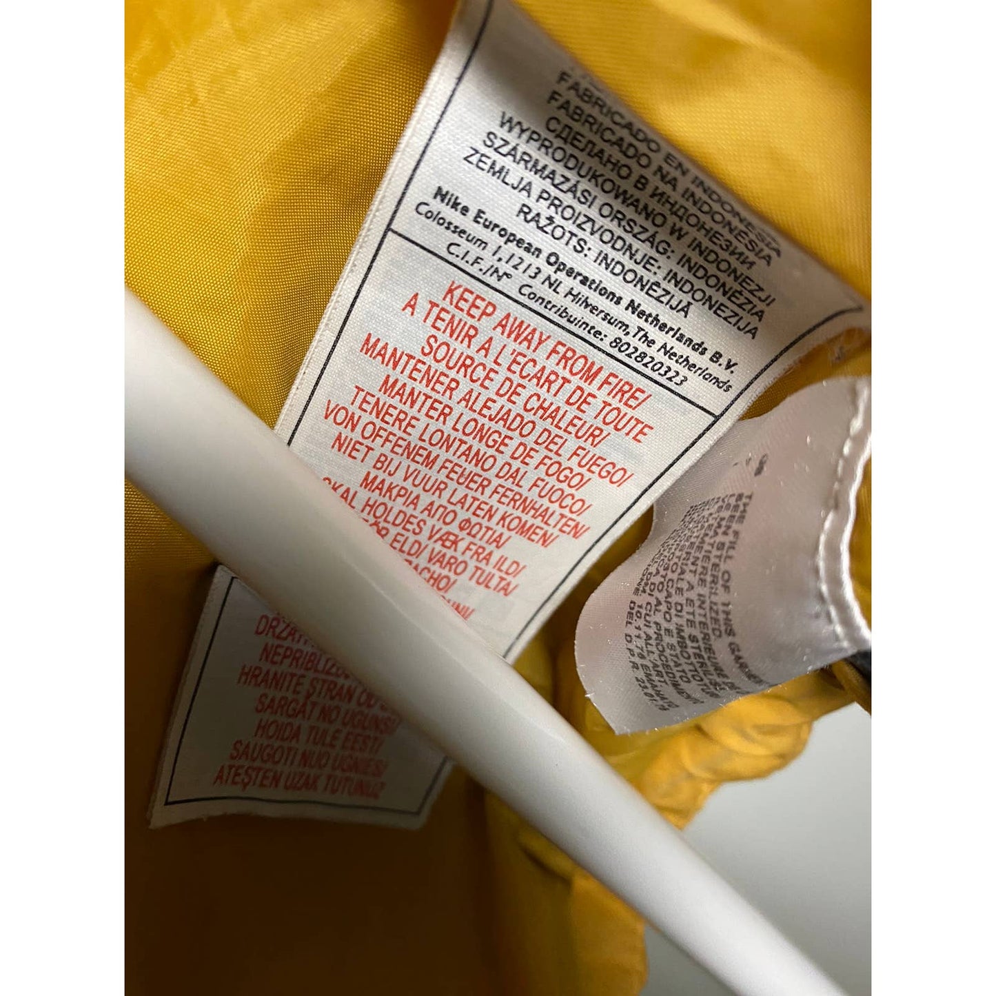 Nike vintage yellow puffer vest small swoosh 2000s