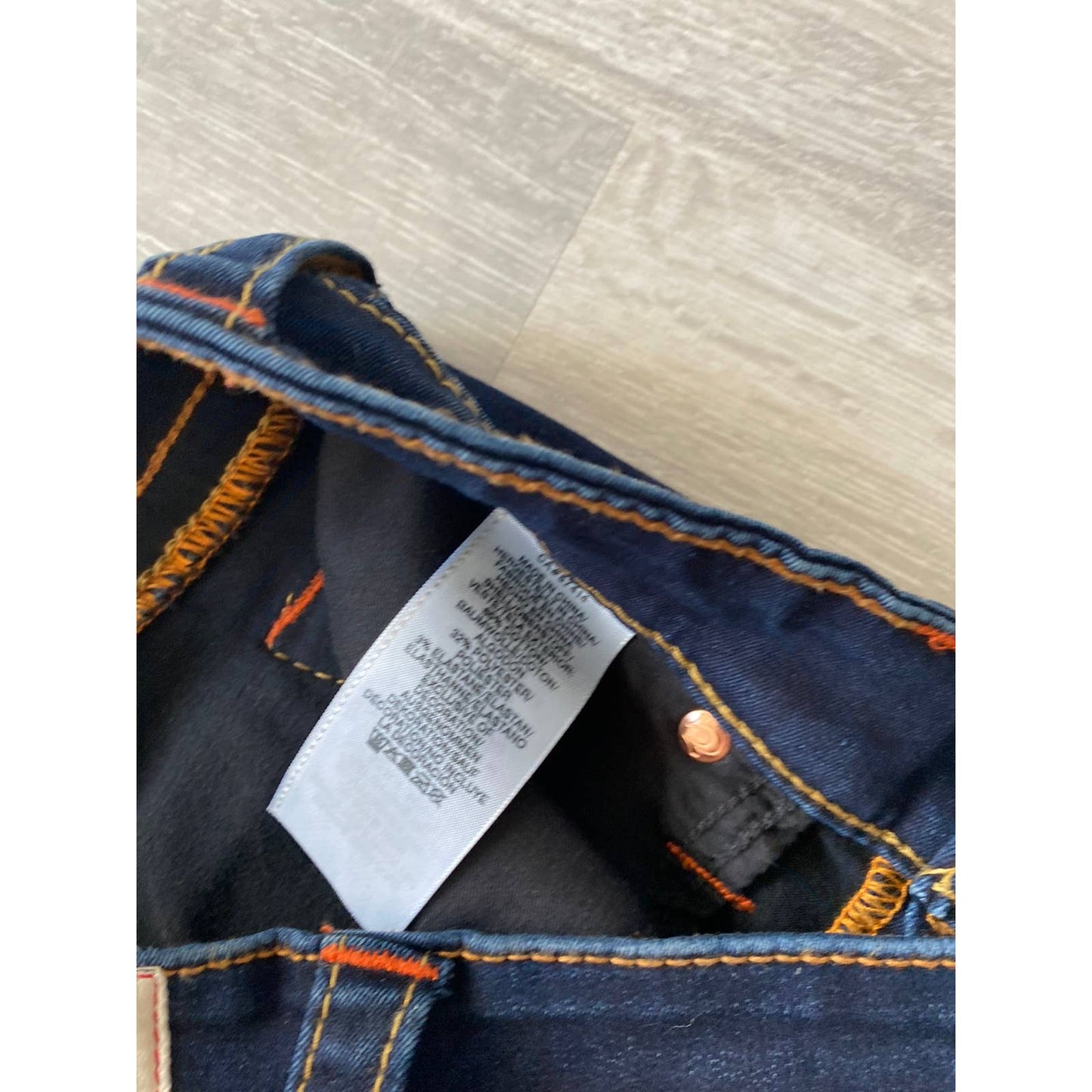 True Religion vintage navy jeans orange stitching