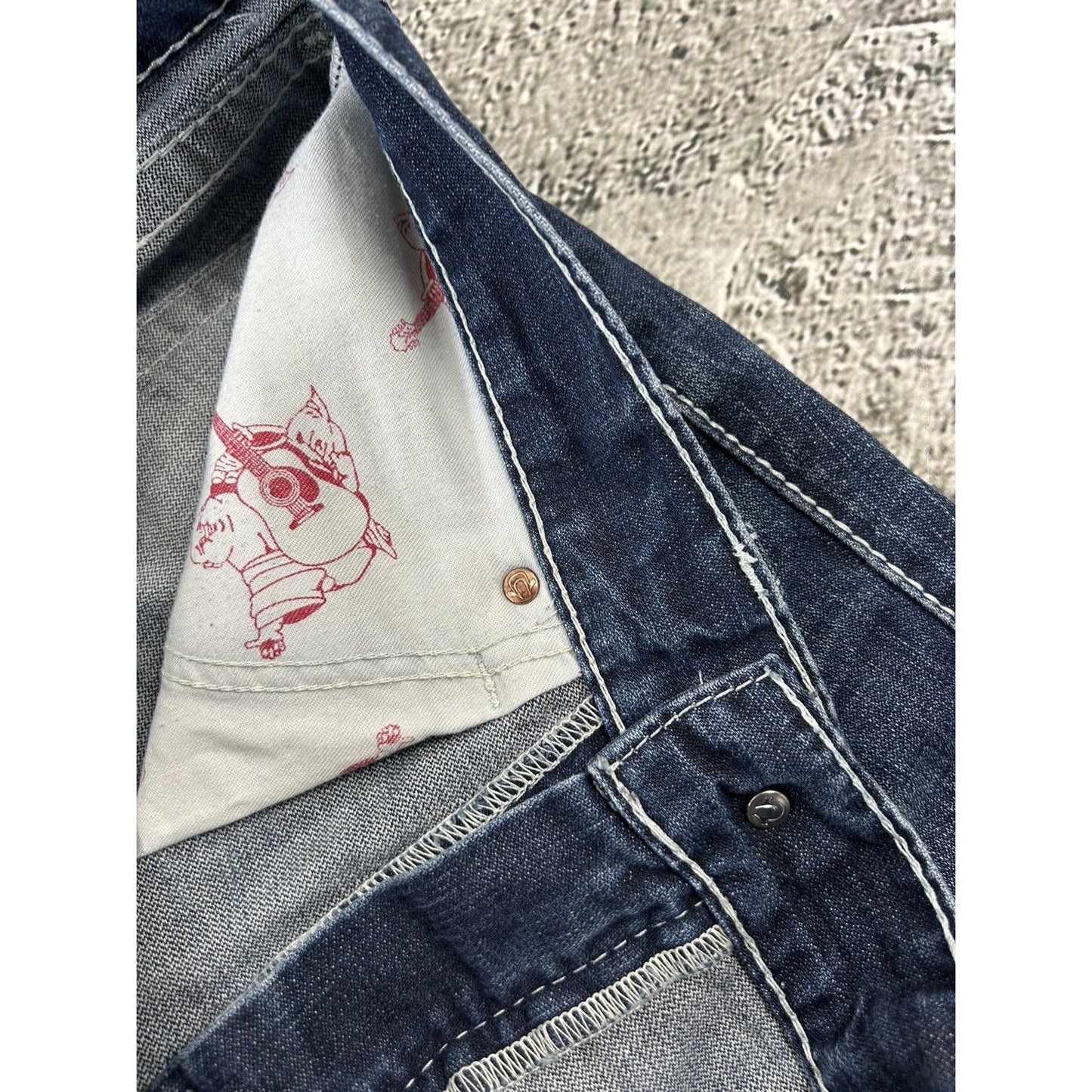 True Religion blue jeans white thick stitching baggy flared