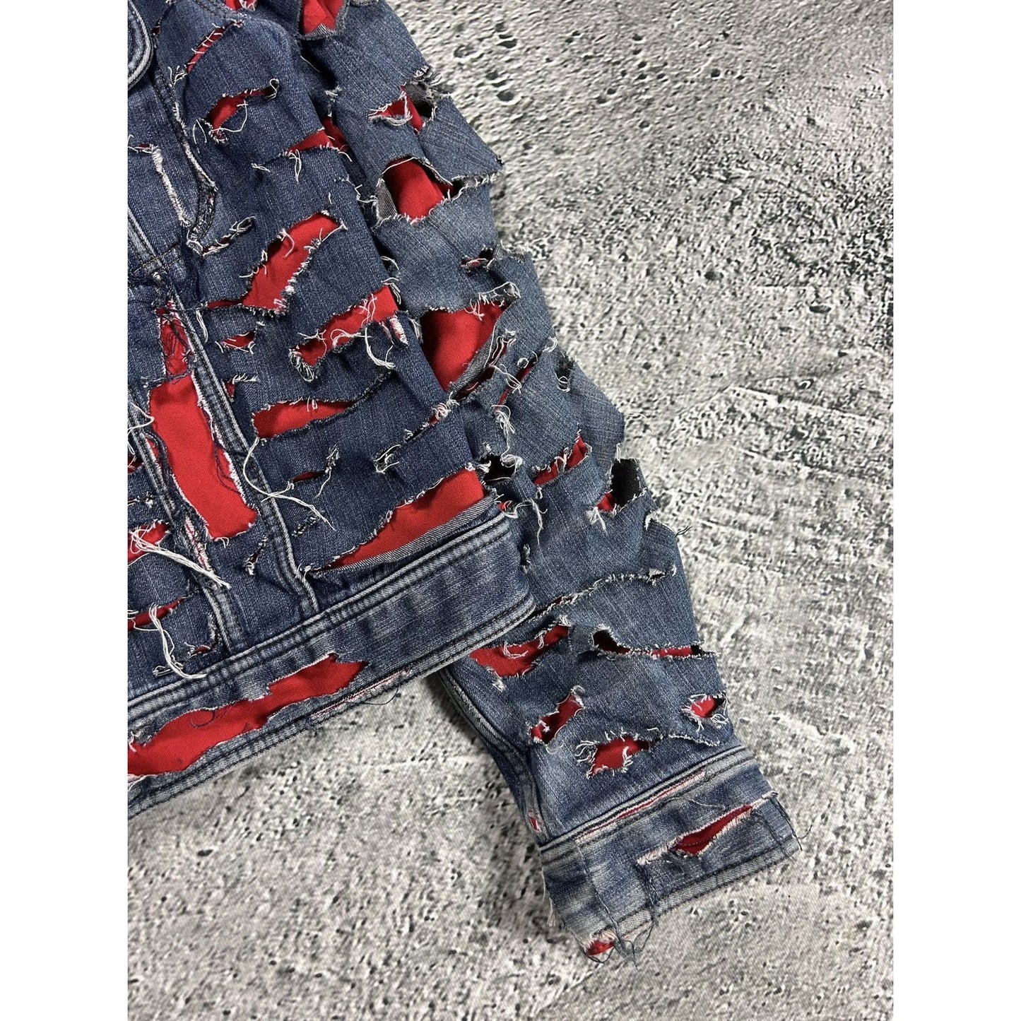 Dolce & Gabbana denim jacket distressed blue red avant garde