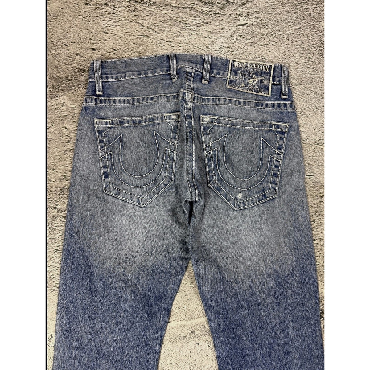True Religion blue washed jeans white thick stitching Logan