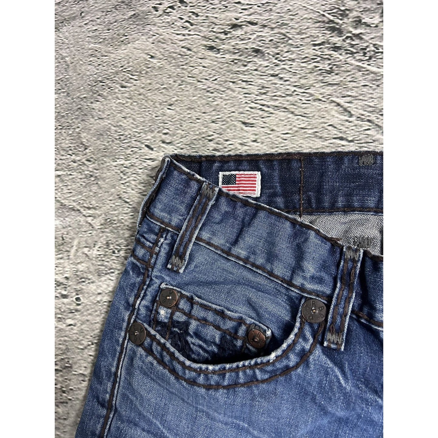 True Religion blue jeans white thick stitching Logan