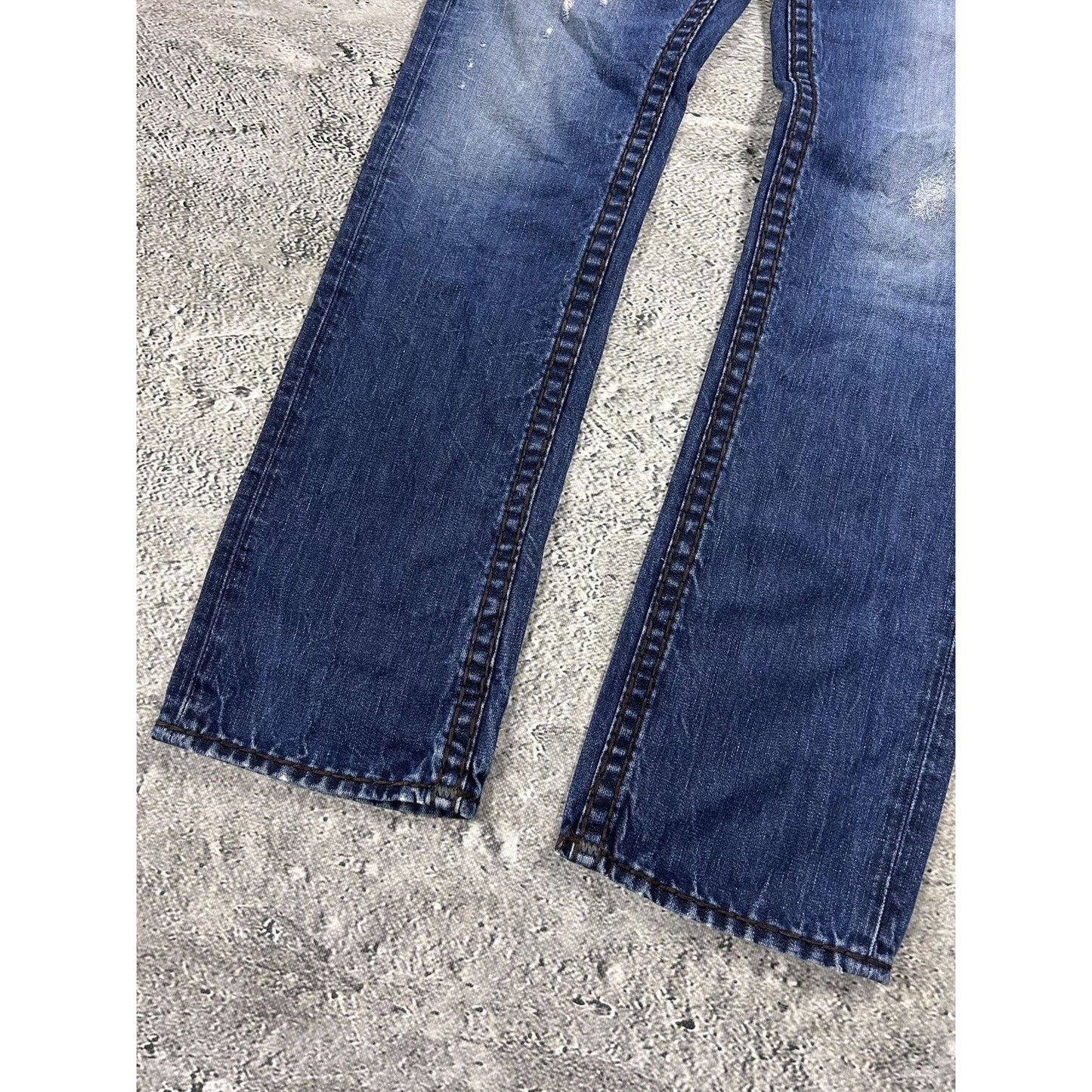 True Religion blue jeans white thick stitching Logan