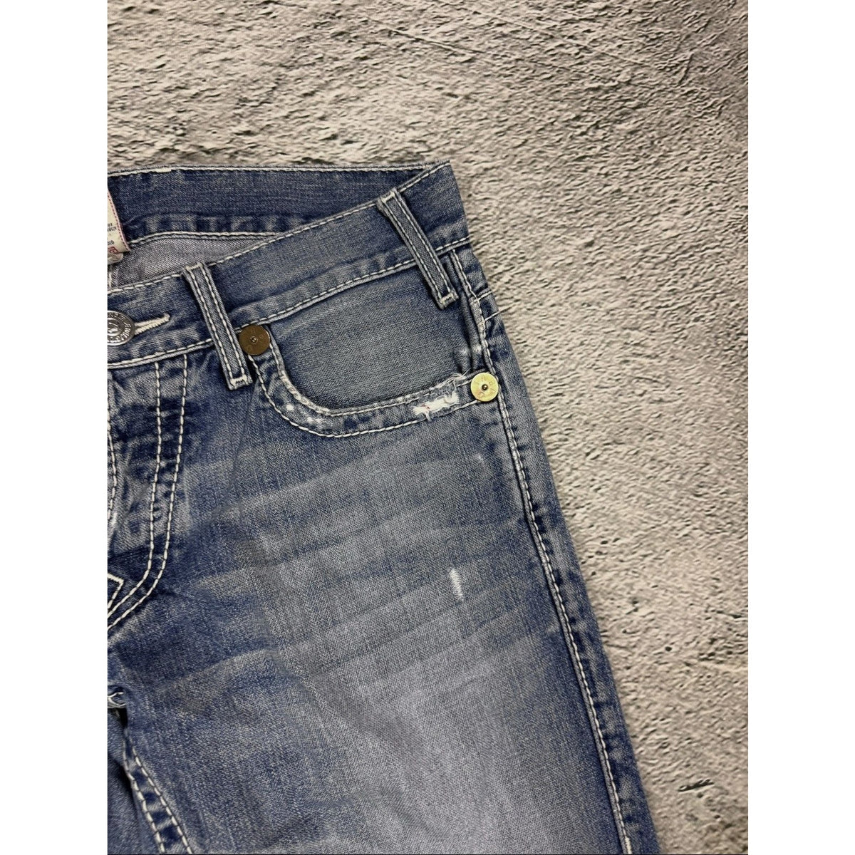 True Religion blue washed jeans white thick stitching Logan