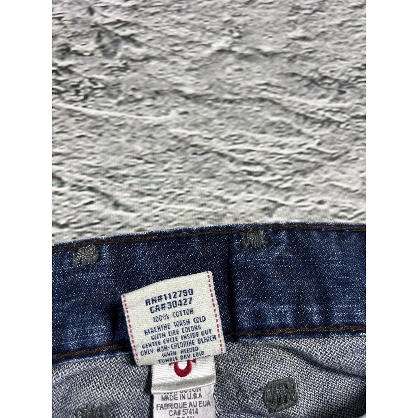 True Religion blue jeans white thick stitching Logan