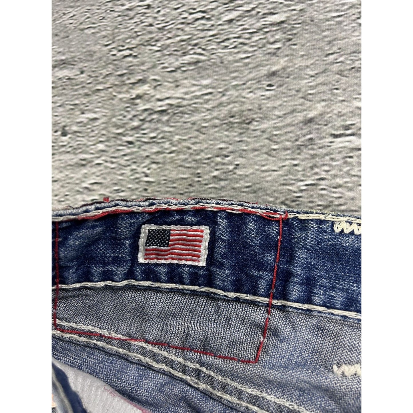 True Religion blue jeans white thick stitching Bobby