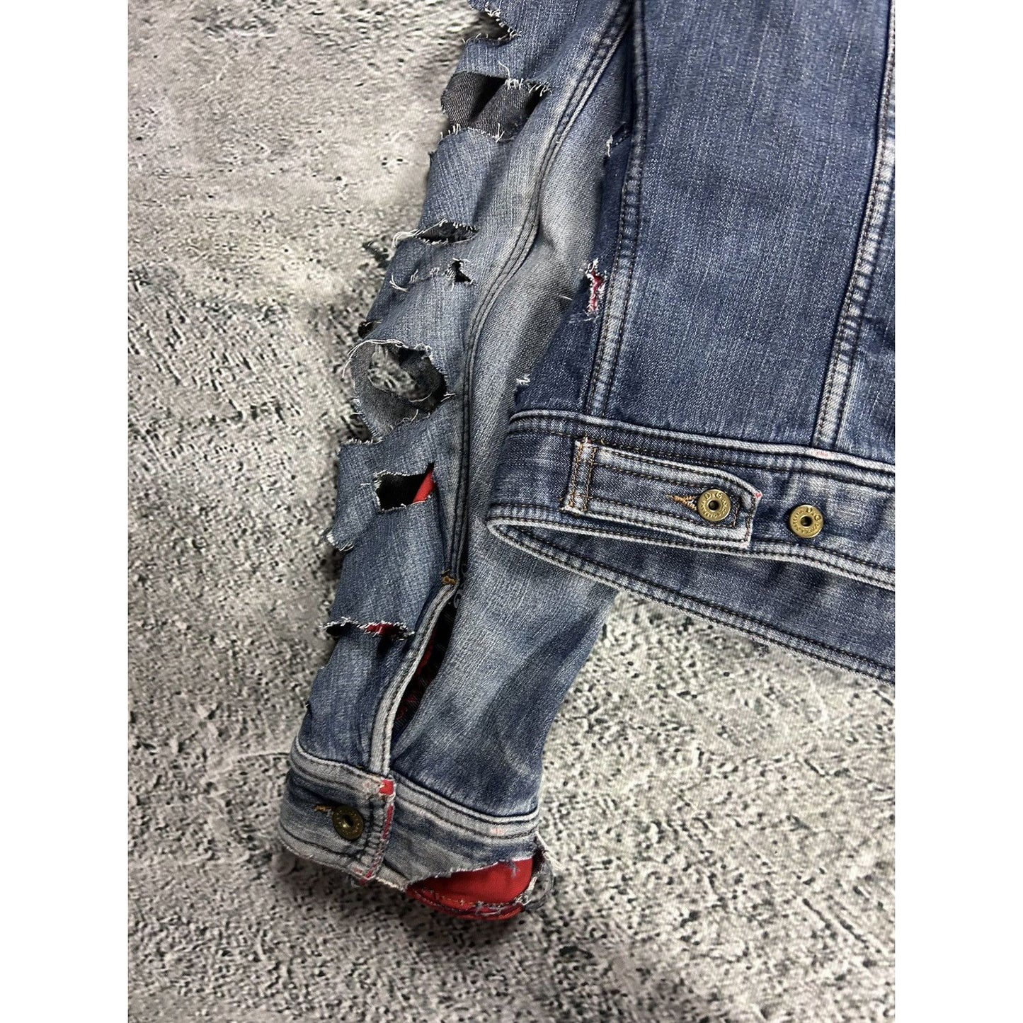 Dolce & Gabbana denim jacket distressed blue red avant garde