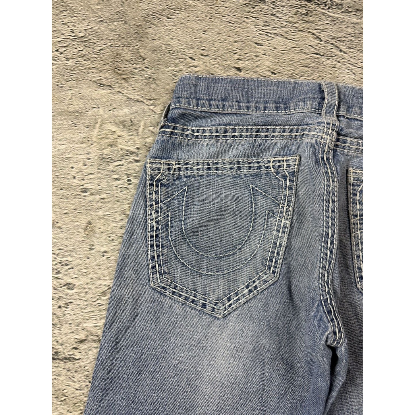 True Religion washed light blue jeans white stitching Bobby
