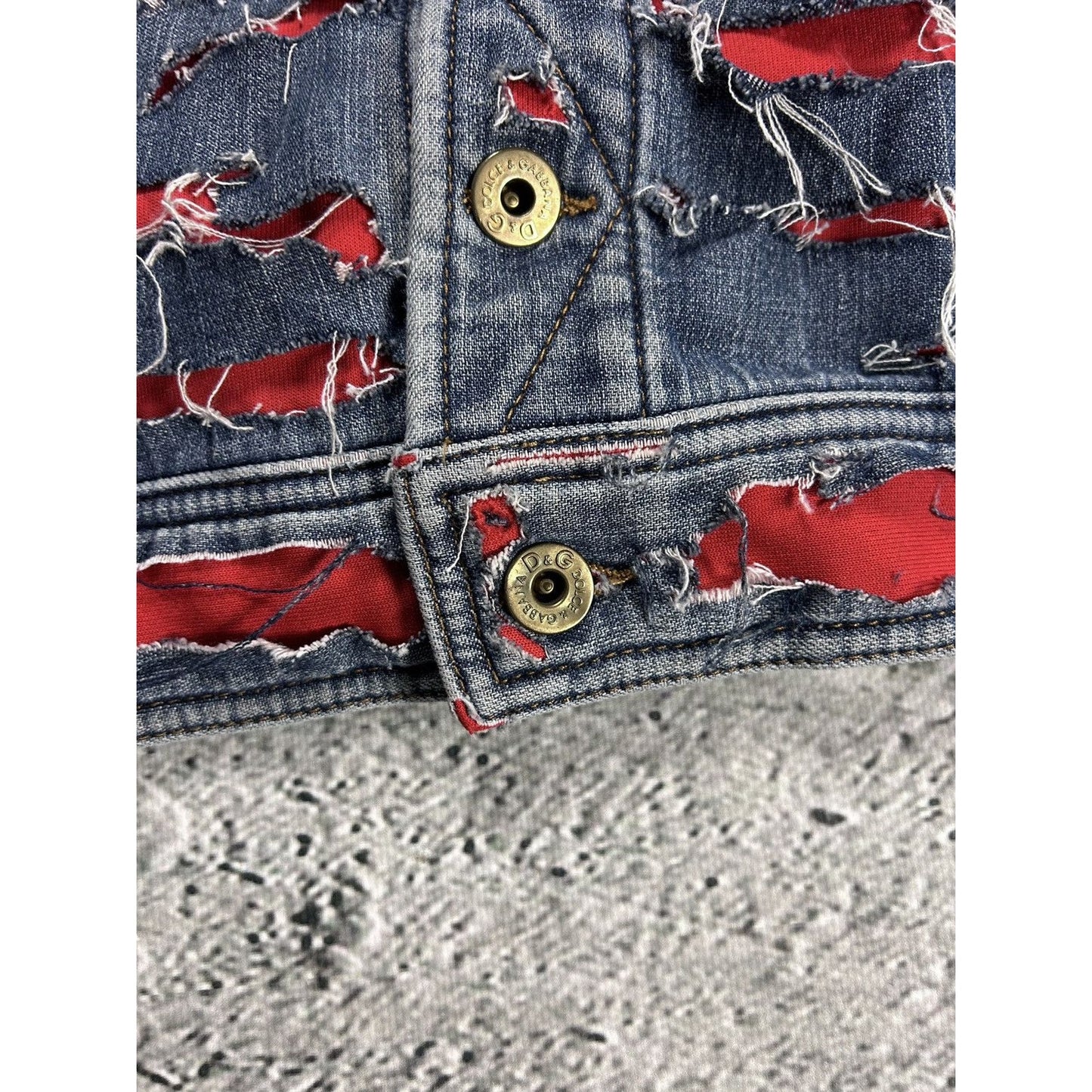 Dolce & Gabbana denim jacket distressed blue red avant garde
