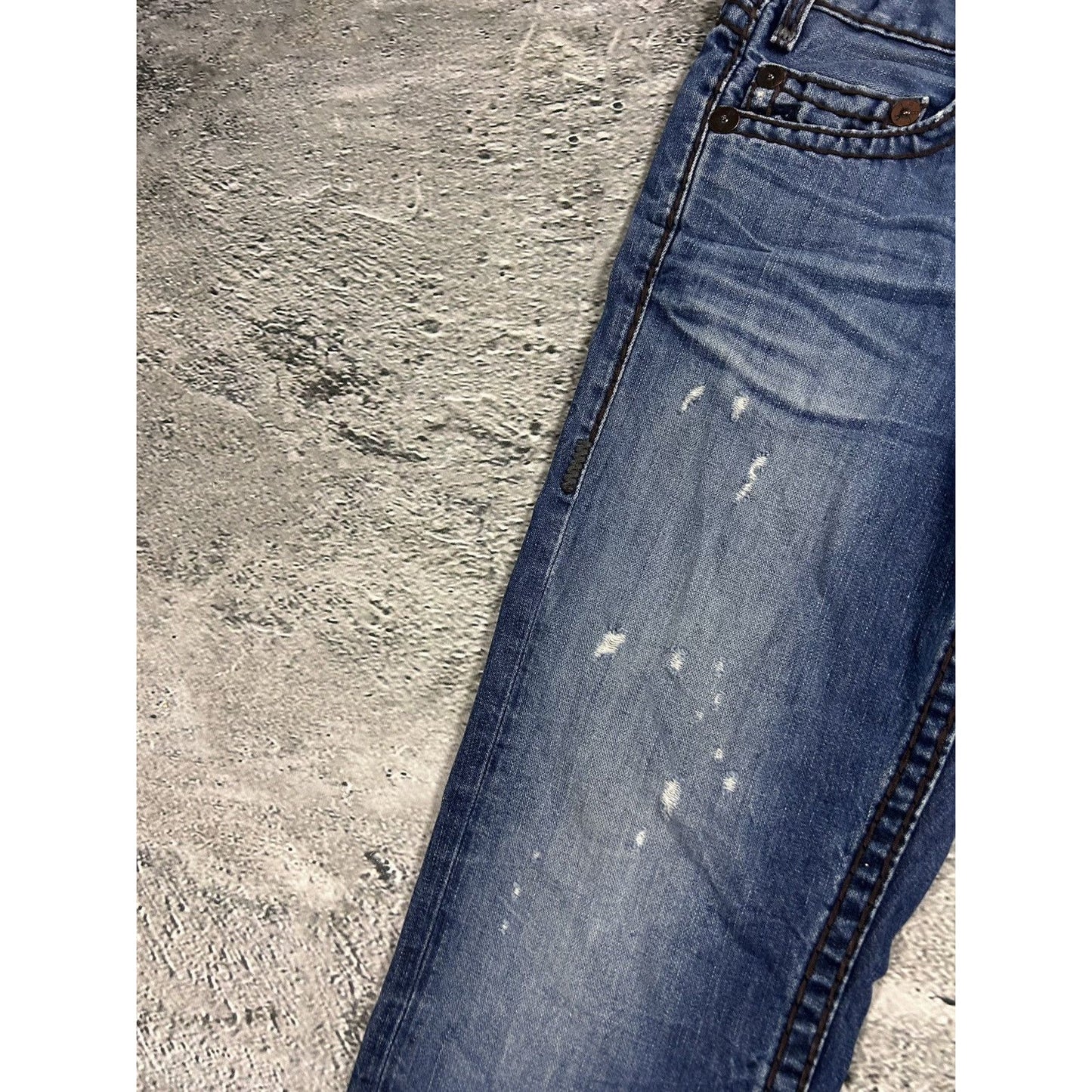 True Religion blue jeans white thick stitching Logan