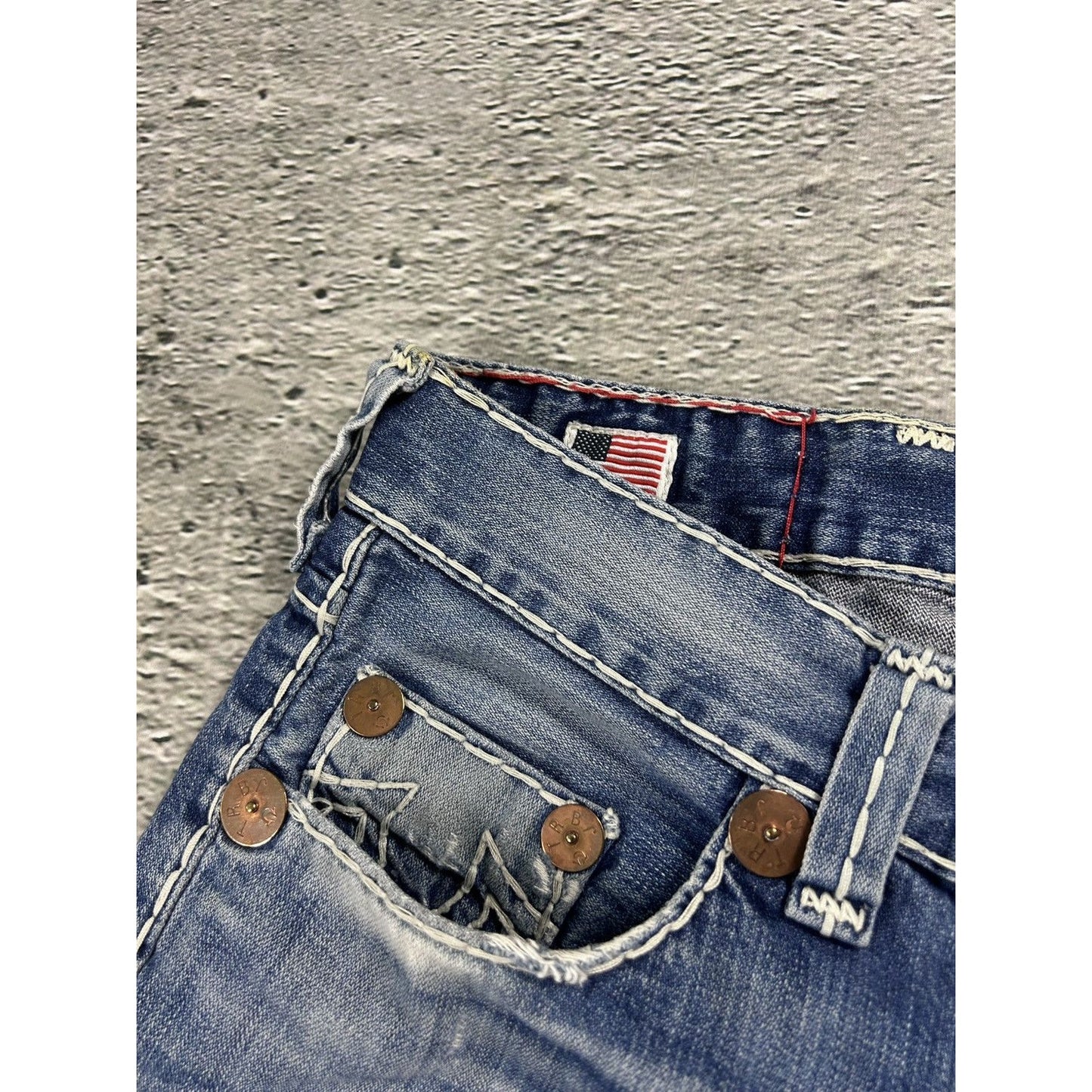 True Religion blue jeans white thick stitching Bobby