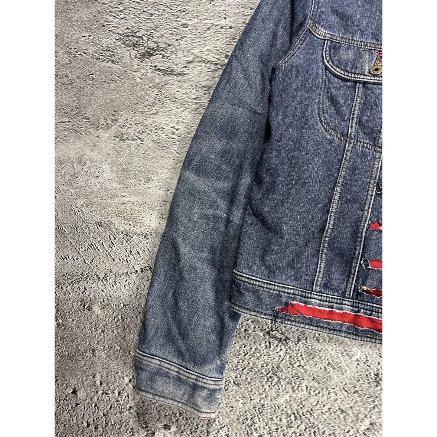 Dolce & Gabbana denim jacket distressed blue red avant garde