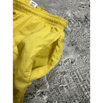 Nike vintage yellow shorts small swoosh 90s track pants