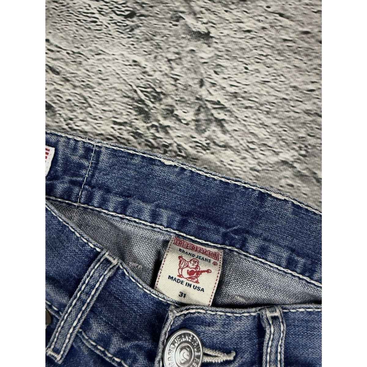 True Religion blue washed jeans white thick stitching Logan