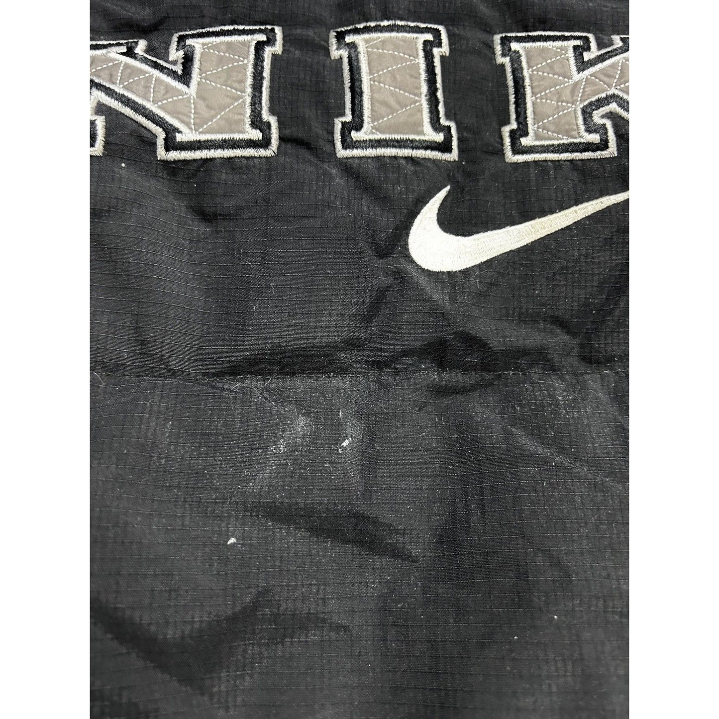 Nike black puffer jacket big logo vintage 90s spell out