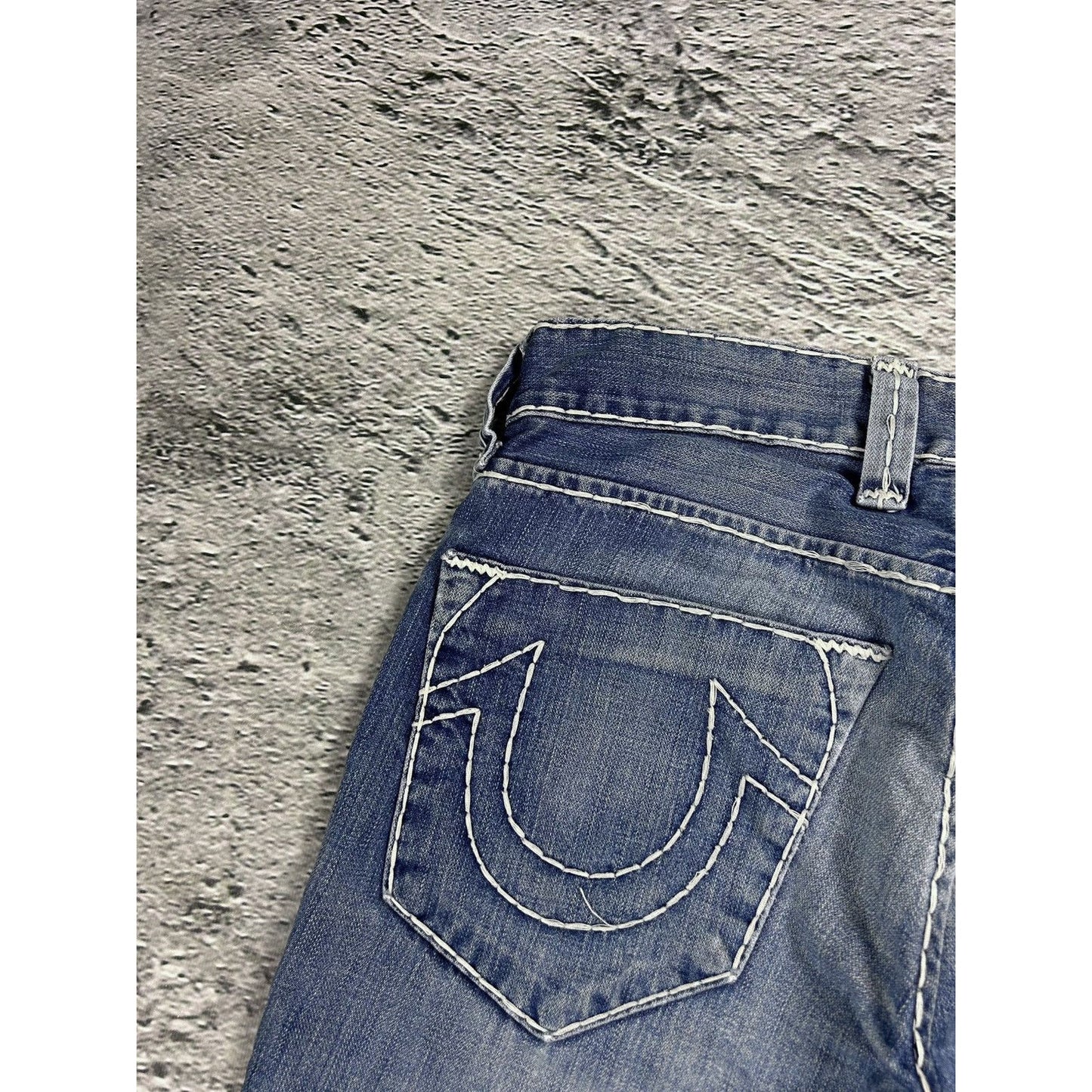 True Religion blue jeans white thick stitching Bobby