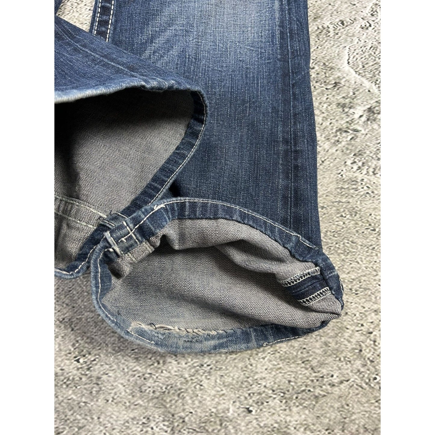 True Religion blue jeans white thick stitching baggy flared