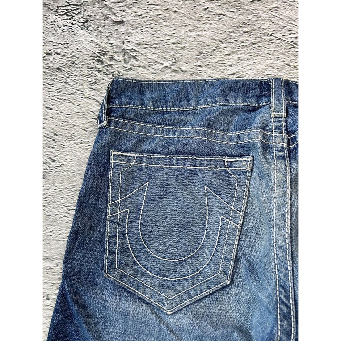 True Religion blue jeans white thick stitching Bobby