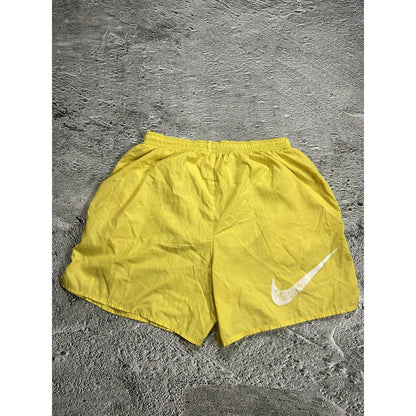 Nike vintage yellow shorts small swoosh 90s track pants