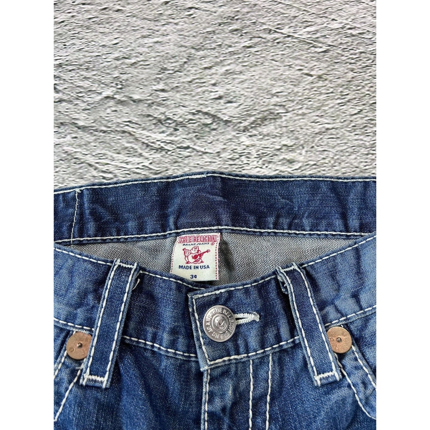 True Religion blue jeans white thick stitching Bobby