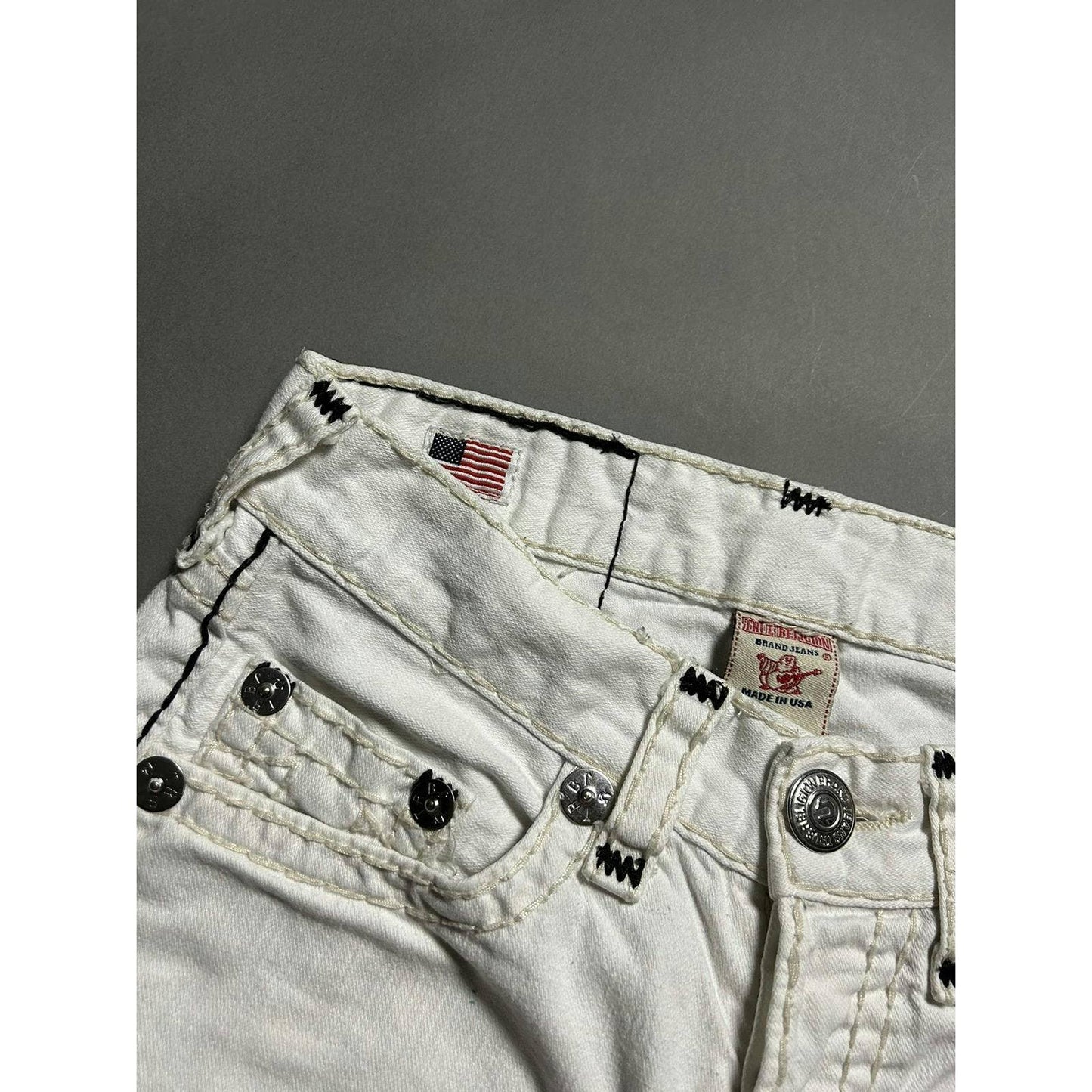 True Religion vintage white jeans denim black stitching