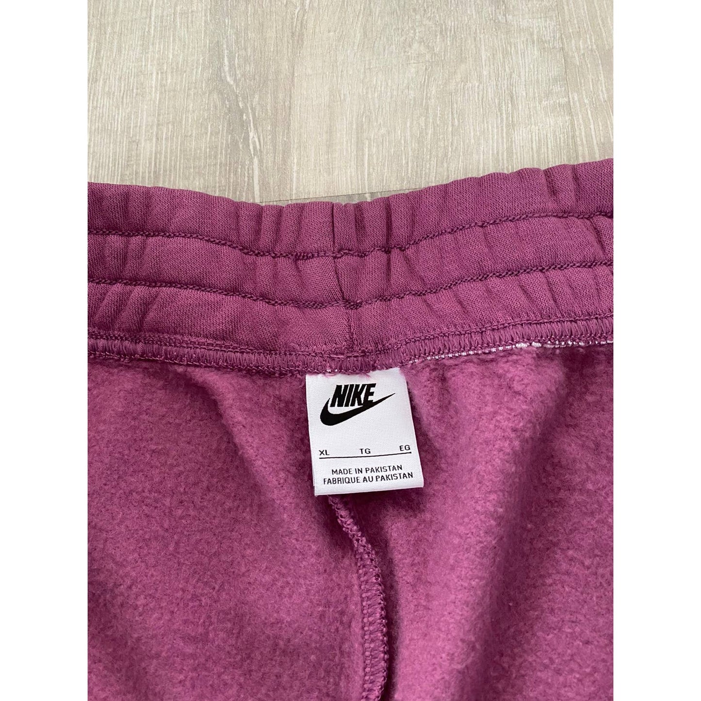 Nike pink sweatpants small swoosh