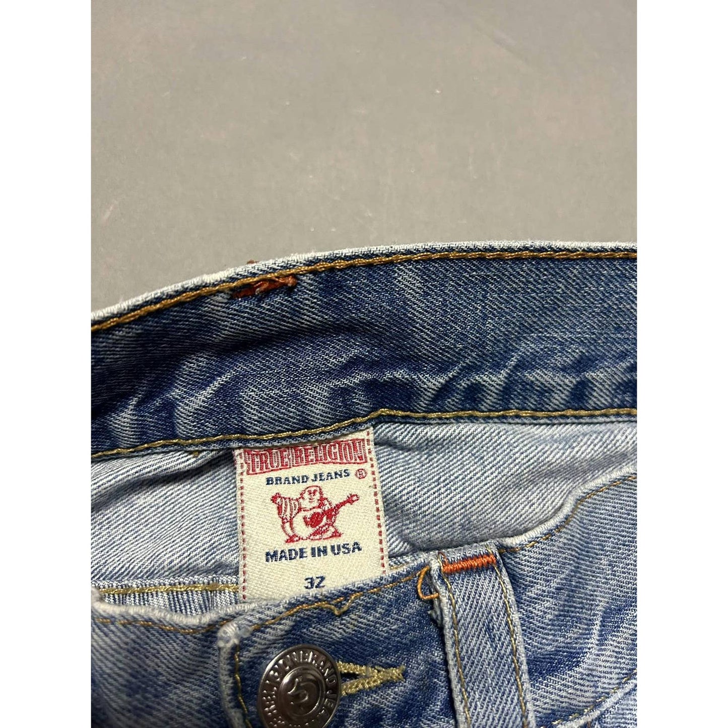 True Religion vintage blue jeans white big logo