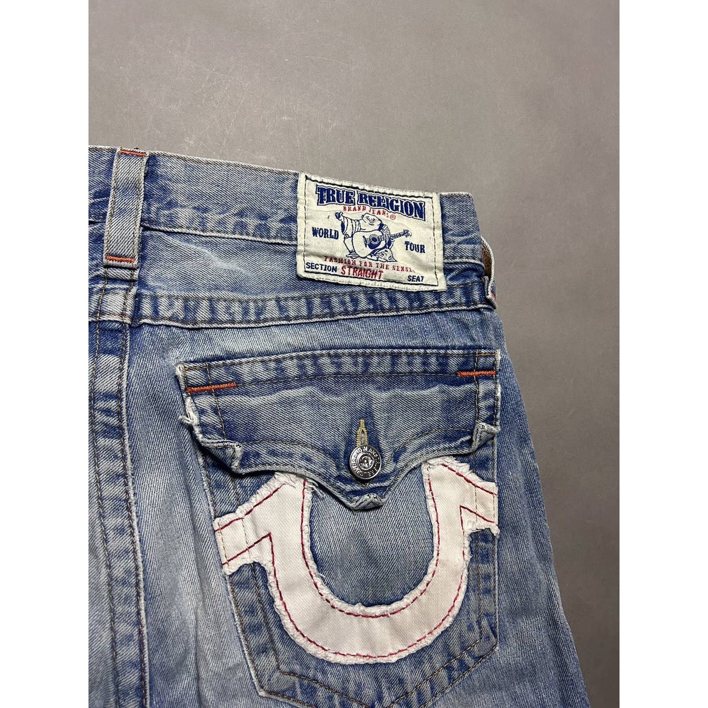 True Religion vintage blue jeans white big logo