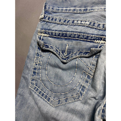 True Religion blue jeans white thick stitching distressed