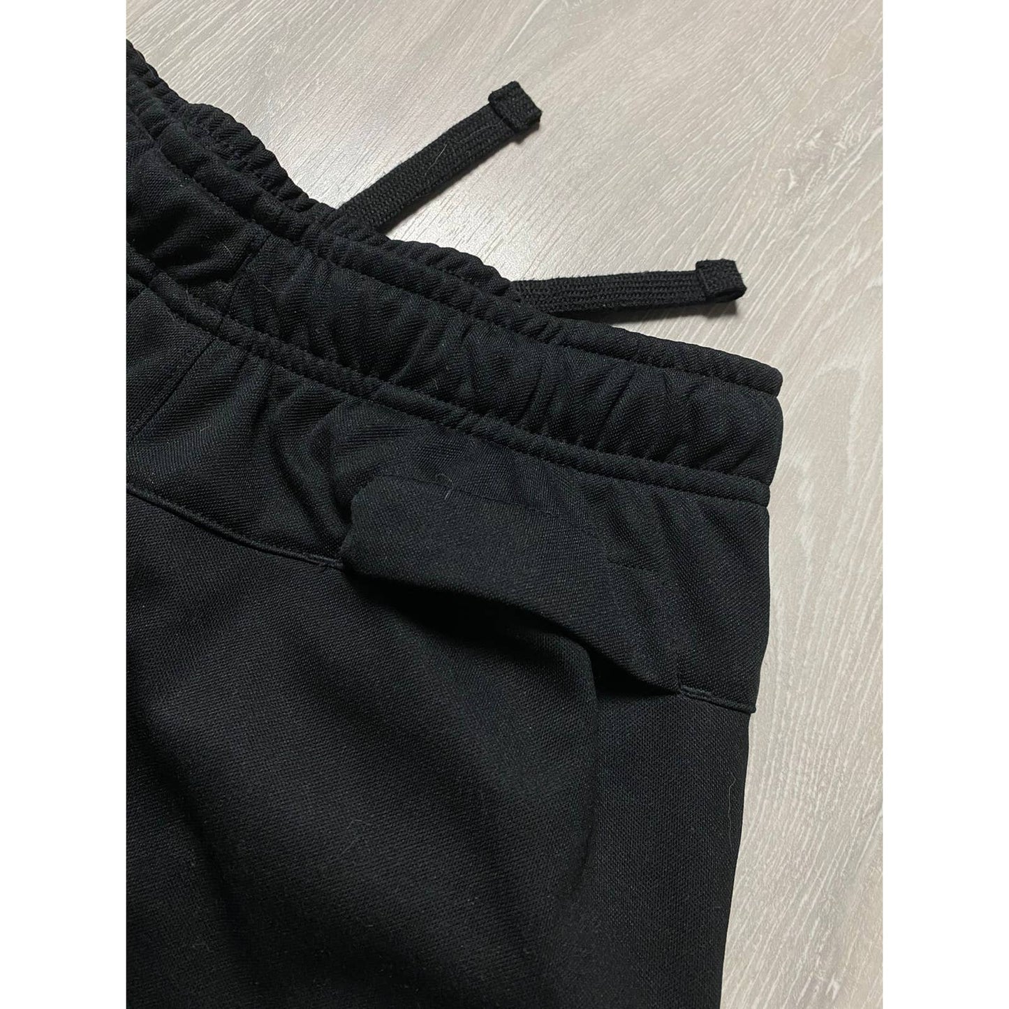 Nike vintage black sweatpants spell out big logo