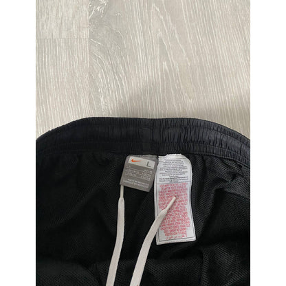 Nike vintage black track pants small swoosh 2000s – Refitted