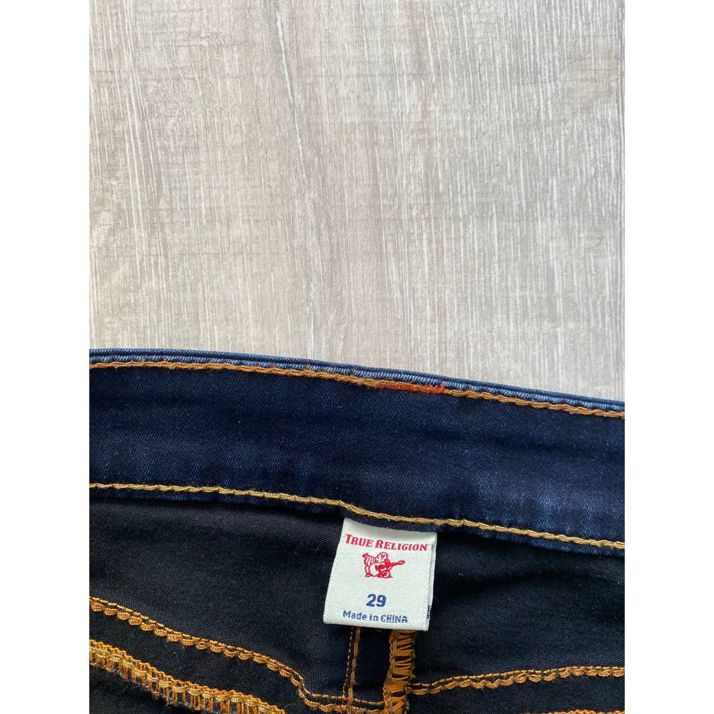 True Religion vintage navy jeans orange stitching