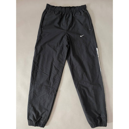 Nike vintage black track pants small swoosh spell out