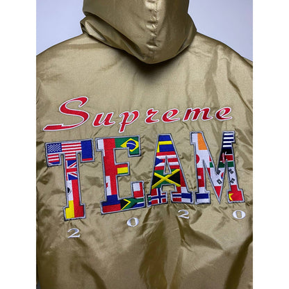 Supreme Team Puffy Jacket Gold big logo flags