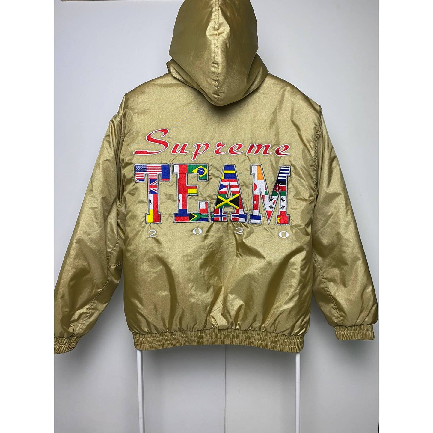 Supreme Team Puffy Jacket Gold big logo flags