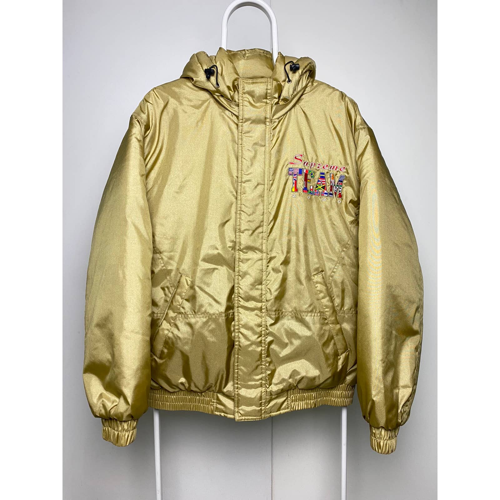 Supreme gold outlet jacket