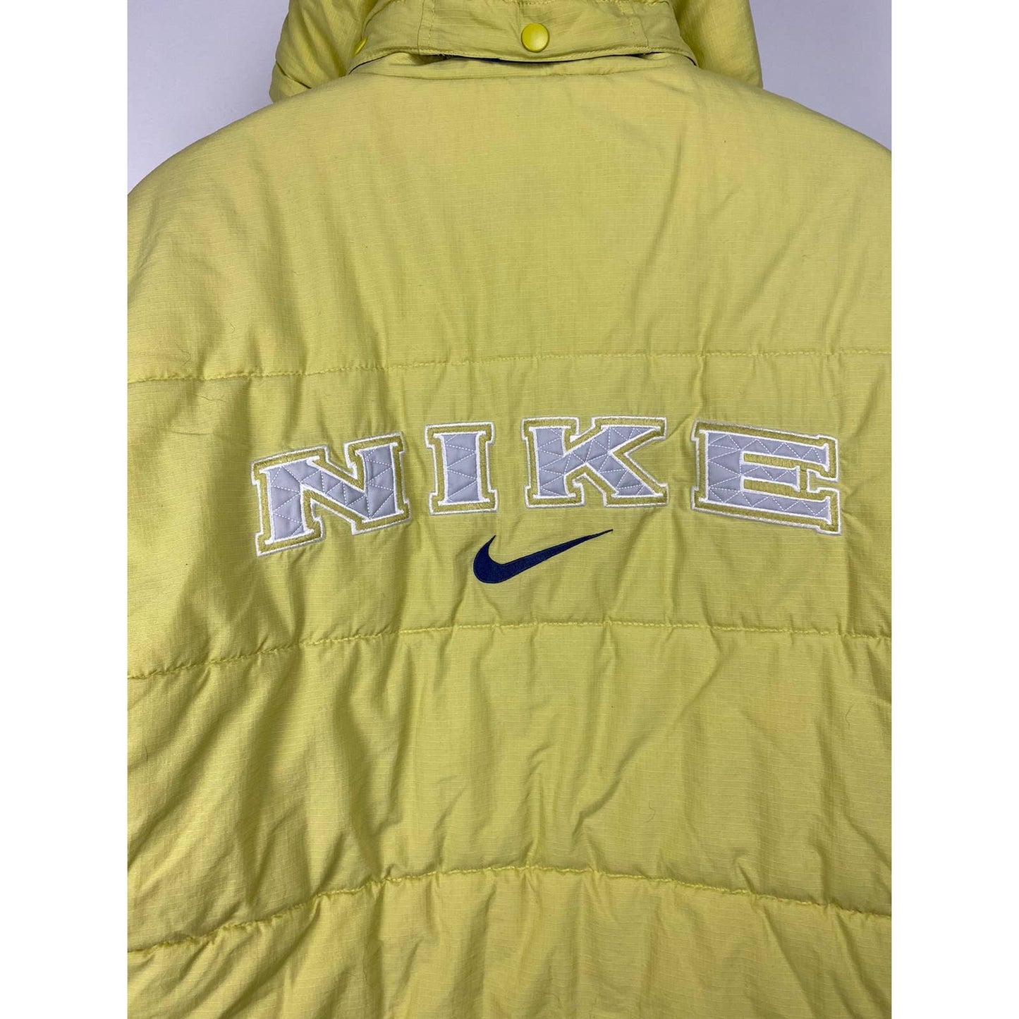 90s Nike vintage spell out puffer jacket small swoosh