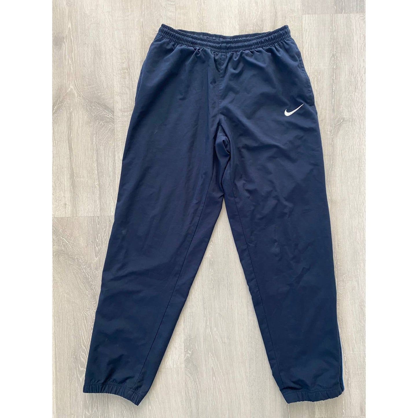 Nike vintage black blue track pants small swoosh 2000s – Refitted